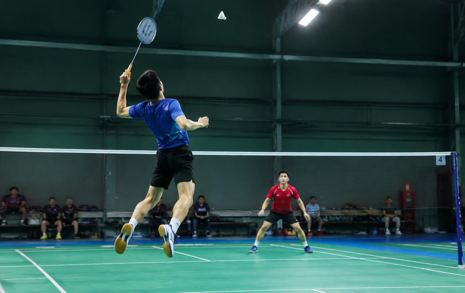 Badminton player leaping for a smash